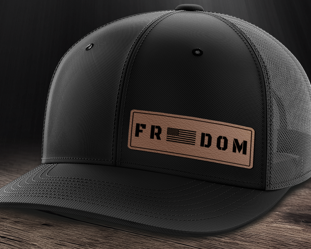 Freedom (left), Leather Patch Trucker Hat