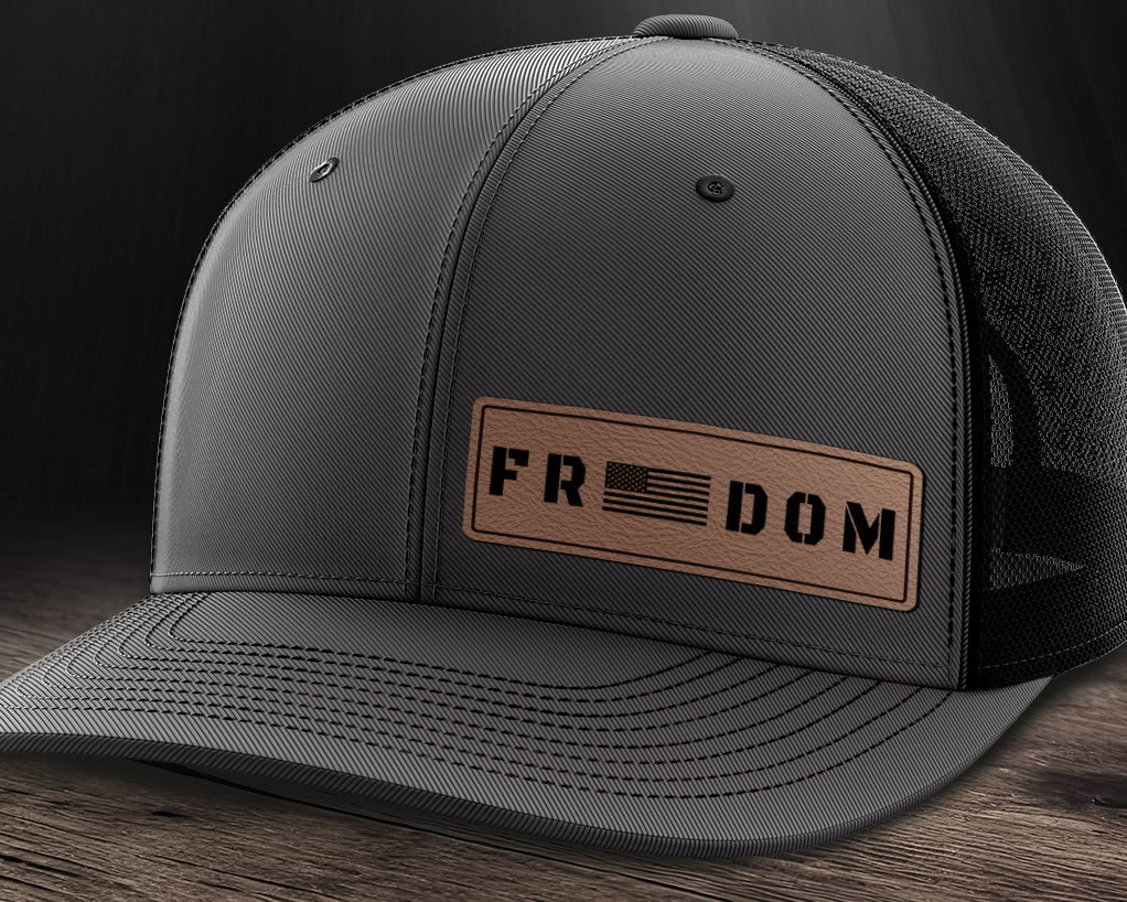 Freedom (left), Leather Patch Trucker Hat