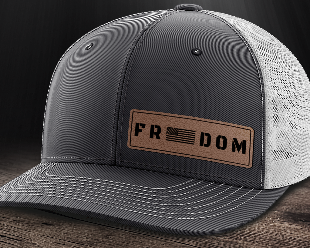 Freedom (left), Leather Patch Trucker Hat