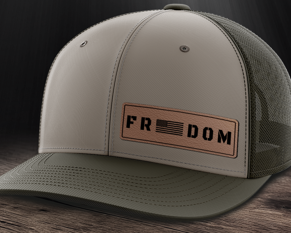 Freedom (left), Leather Patch Trucker Hat