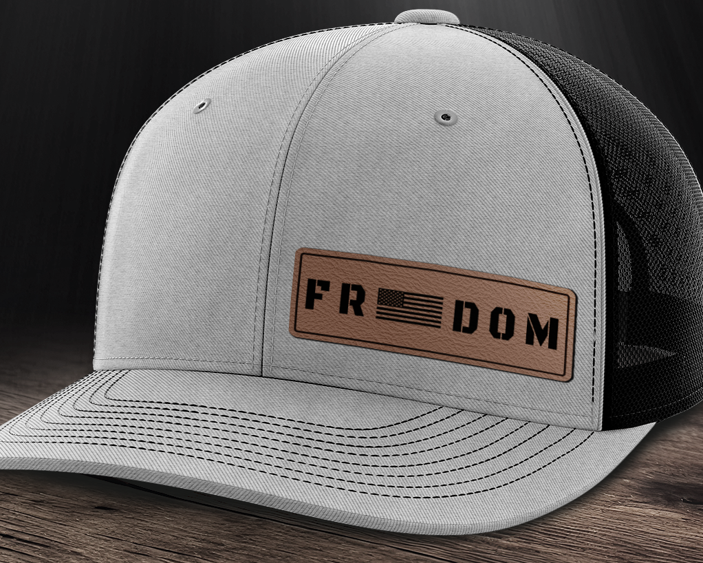 Freedom (left), Leather Patch Trucker Hat