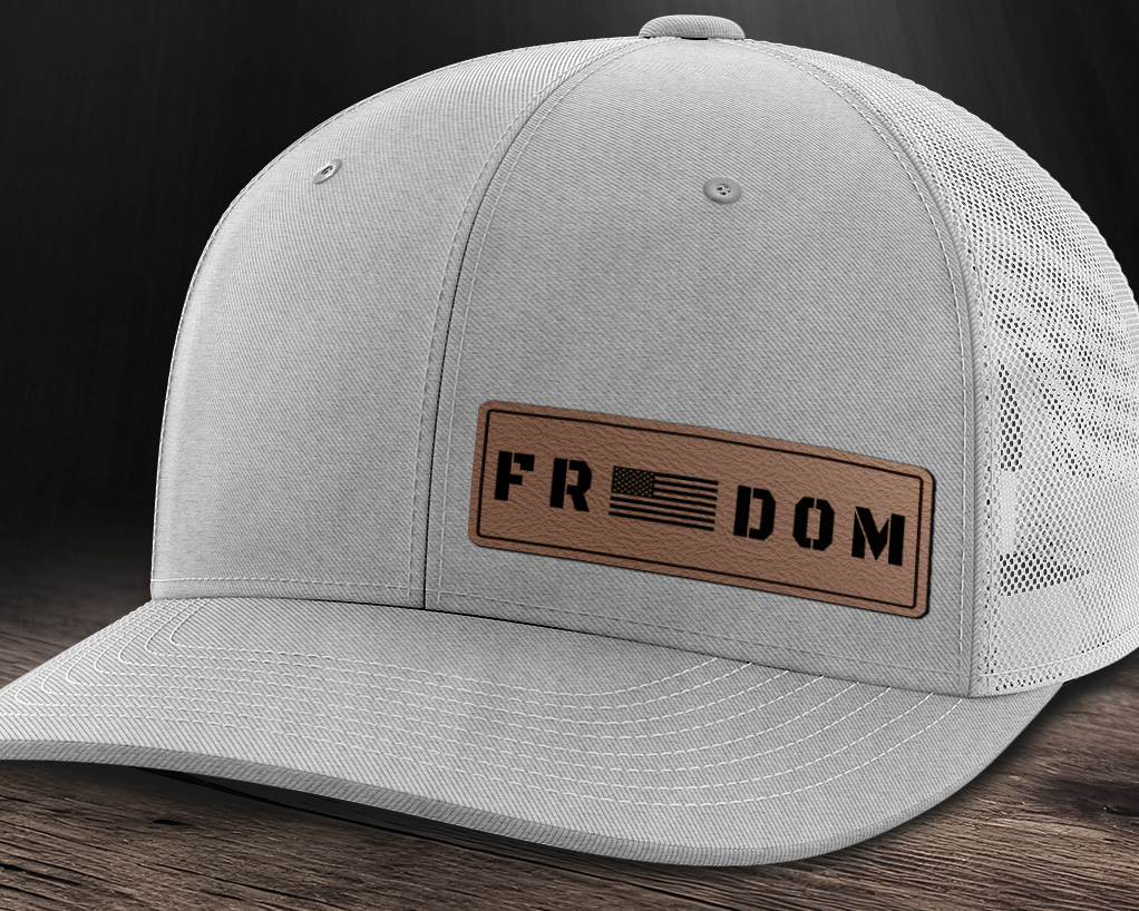 Freedom (left), Leather Patch Trucker Hat