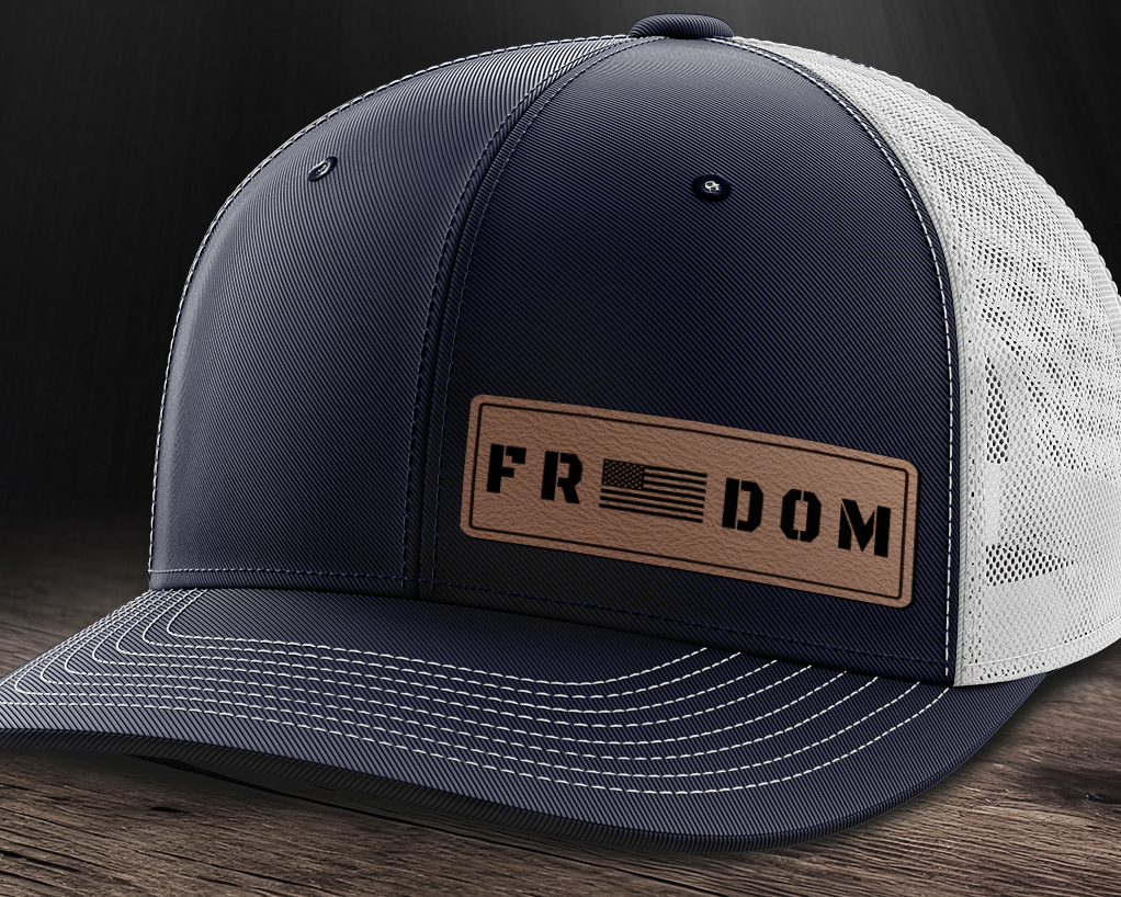 Freedom (left), Leather Patch Trucker Hat