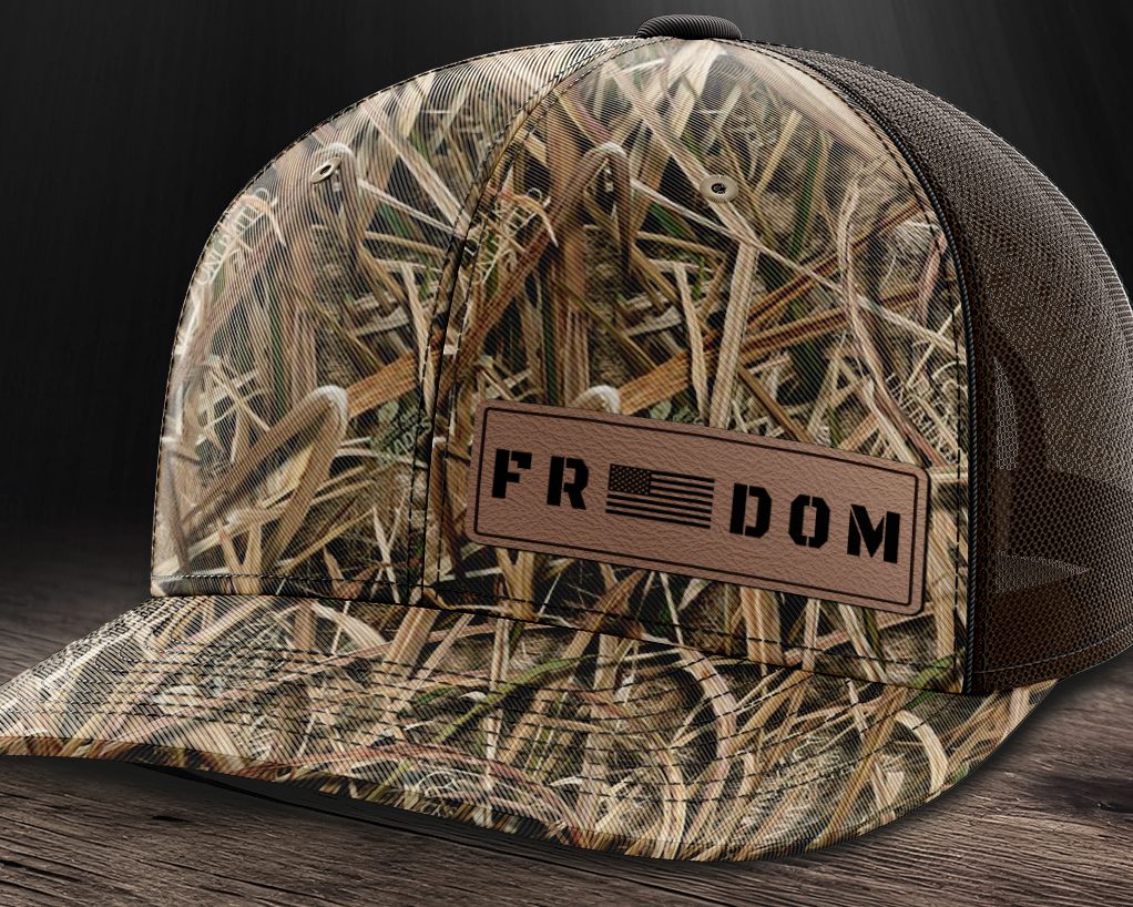 Freedom (left), Leather Patch Trucker Hat